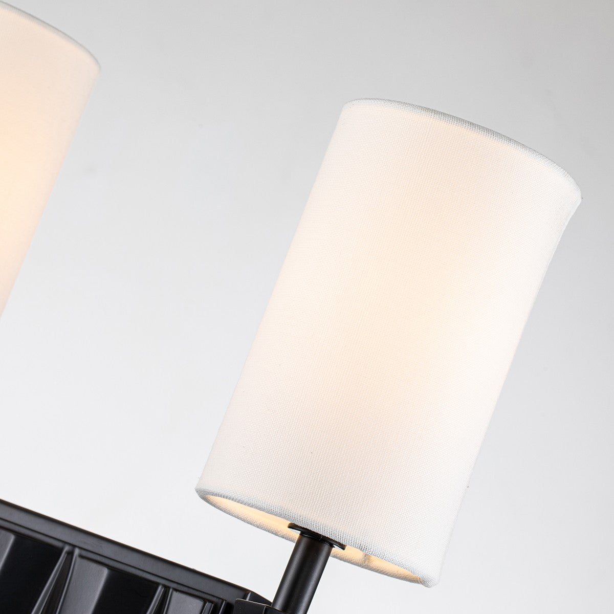 Lucas + McKearn Two Light Wall Sconce from the Crest collection in Matte Black finish